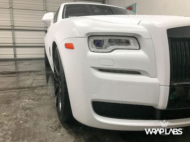 Rolls Royce Wraith White Vinyl Wrap Water Droplets Front Quarter Detail WrapLabs Shop, by Wrap Labs, Westlake Village