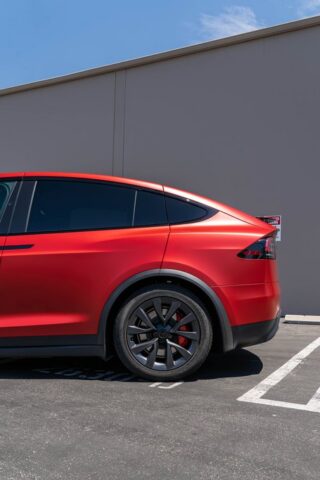 Tesla Model X Matte Red CPF Rear Quarter Wheel Portrait, by Wrap Labs, Westlake Village