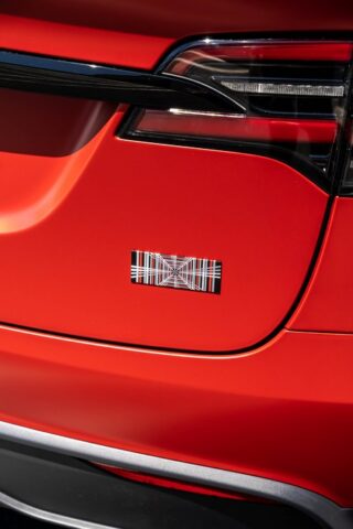 Tesla Model X Matte Red Color pain protection film Rear Quarter Badge Closeup, by Wrap Labs, Westlake Village