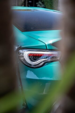 Toyota 86 Teal Chrome Vinyl Wrap Taillight Through Hedge Detail, by Wrap Labs, Westlake Village