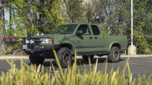 Toyota Tundra Matte Military Green Vinyl Wrap Front Low Grass Foreground, by Wrap Labs, Westlake Village